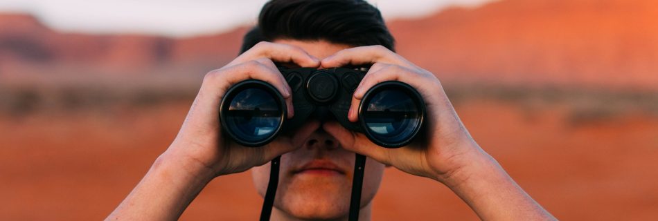 Man with binoculars